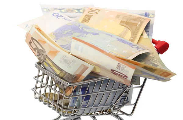 Carrinho de compras cheio de notas de euro sobre fundo branco — Fotografia de Stock