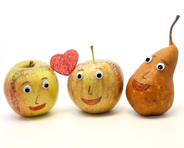 Two big apples with the heart and a PEAR — Stock Photo, Image