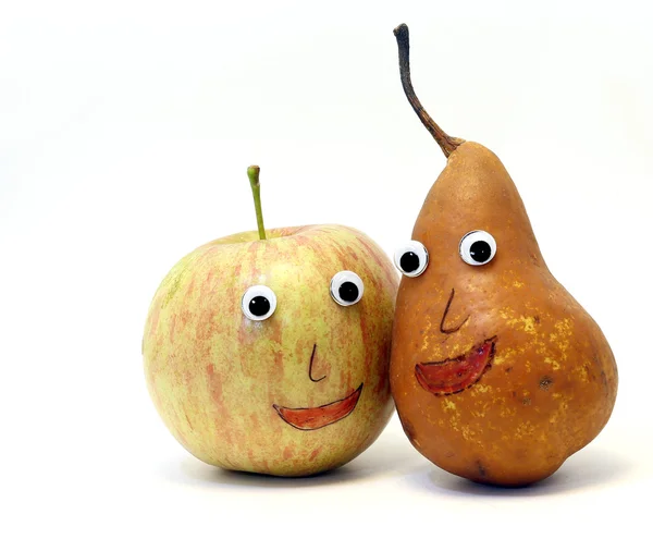 Nice pair of fruits: apple and PEAR with eyes — Stock Photo, Image