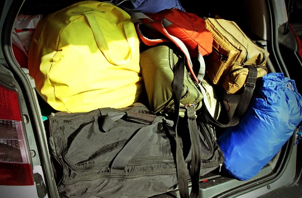 Suitcases and travel bags in the trunk — Stock Photo, Image