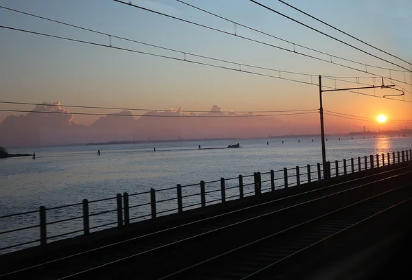 Sunrise on the city of Venice from train — Stock Photo, Image