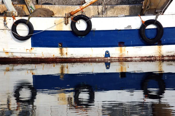 Three pneumatic wheels on fishing to protect the hull — Stock Photo, Image