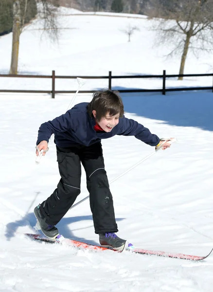 Young boy  falls with cross-country skis — Stock Photo, Image