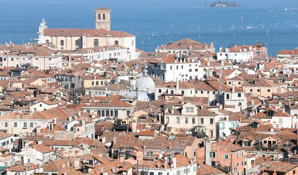 Venice, Italy, red-tiled roofs of the houses and the Church — Stock Photo, Image