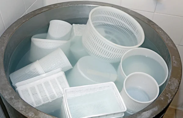 Trays for the production of cheese in a mountain dairy — Stock Photo, Image