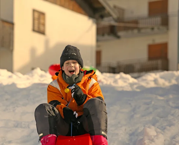 Young boy  in the winter plays with bob — Stock Photo, Image