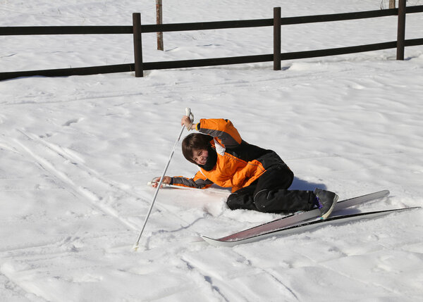 inexperienced boy trying for the first time the cross-country sk