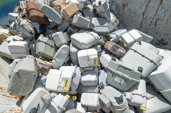 Old abandoned gas counters in waste landfill — Stock Photo, Image