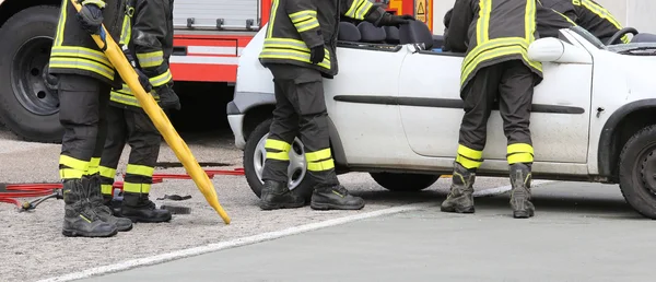 Road accident with car parts and the firetruck — Stock Photo, Image