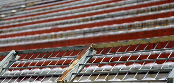 Net protection of a soccer stadium before the sporting event Stock Picture