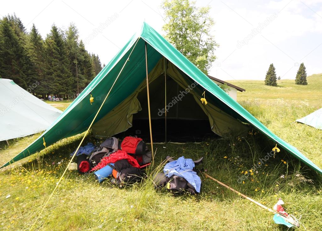 Big tent of boy scout camp with backpacks and sleeping bags spre — Stock Photo © ChiccoDodiFC