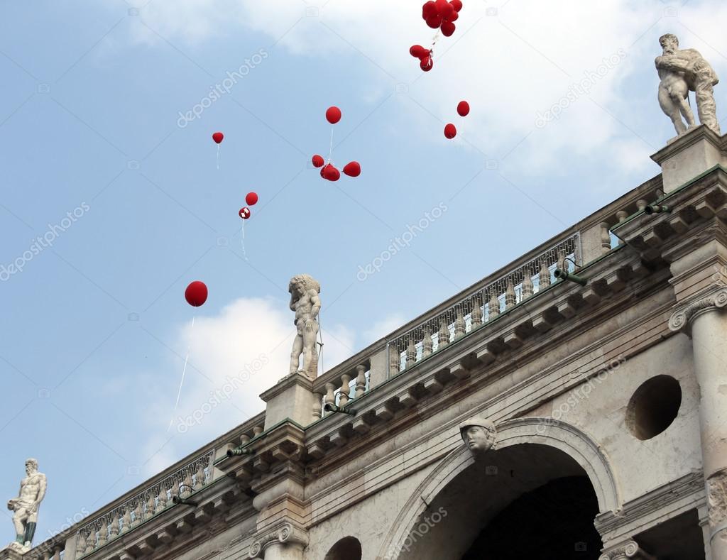 Ancient Palace called BASILICA PALLADIANA with colorful balloons