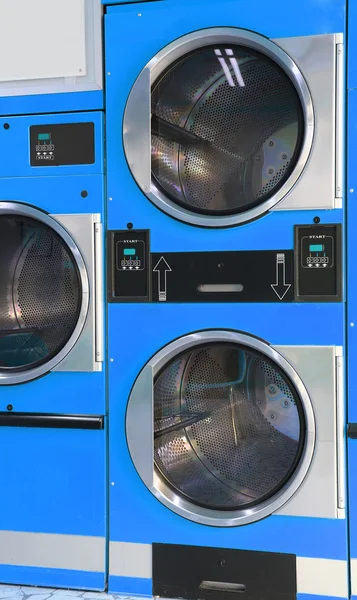 Automatic dryers coin operated in the laundromat — Stock Photo, Image