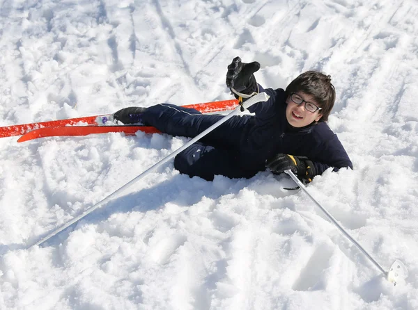 Young boy asks for help after the fall in the mountains in winte — Stock Photo, Image