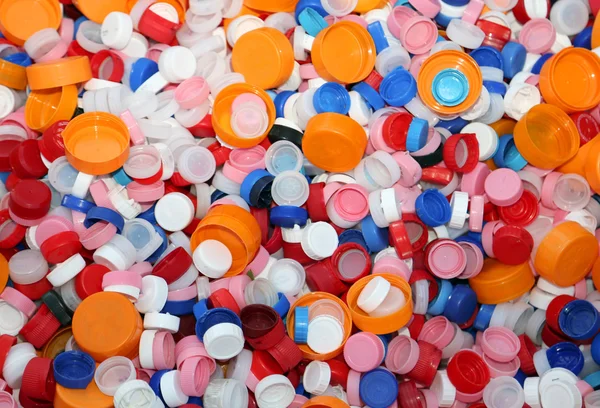 Plastic caps in landfills recyclable waste — Stock fotografie