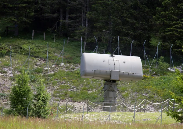 Green military radar into a secret base hidden in the forest of — Stok fotoğraf