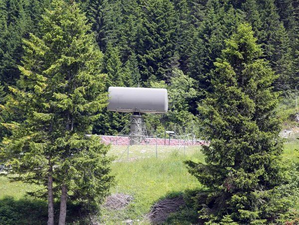 Military radar in the secret base hidden in the forest — ストック写真