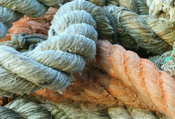 Large robust fishing ropes used by fishermen to moor the boat — Stock Photo, Image