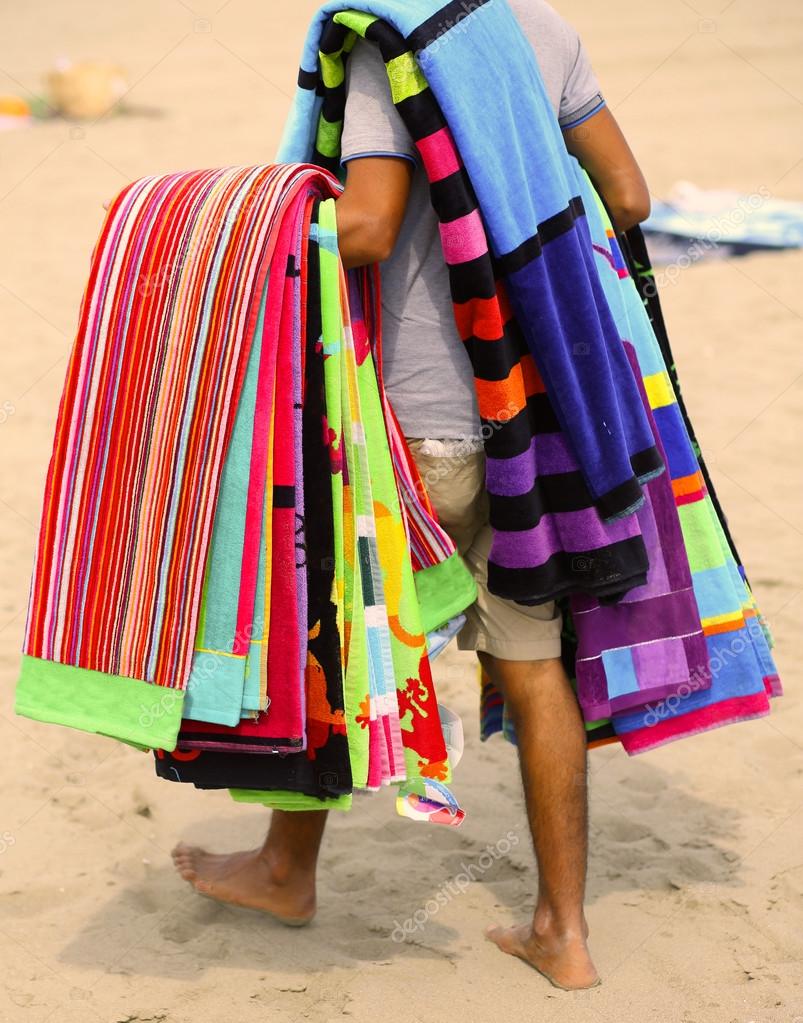 depositphotos_78870212-stock-photo-peddler-of-towels-and-beach.jpg