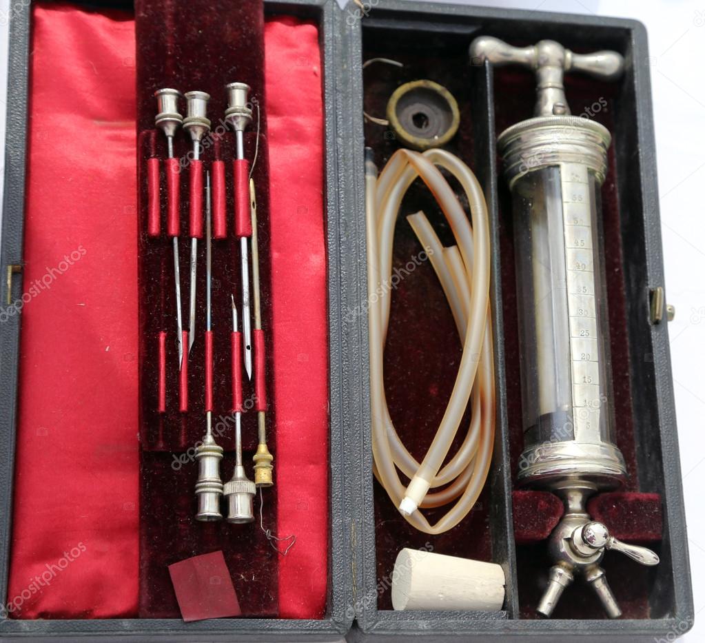 Ancient medical syringe with large glass needles Stock Photo by ©ChiccoDodiFC 79248908