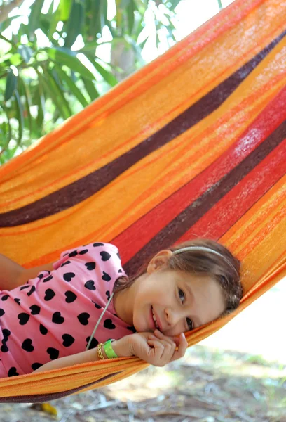 Little girl resting in the hammock in the resort — Stock Photo, Image