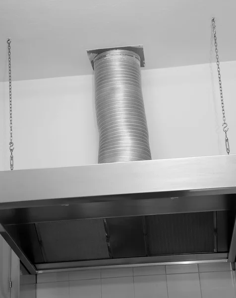 Aluminum pot and a tap in the industrial kitchen — Stock Photo, Image