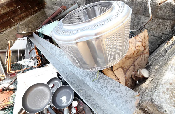 Old pans and washing machine basket in special waste landfill — Stock Photo, Image