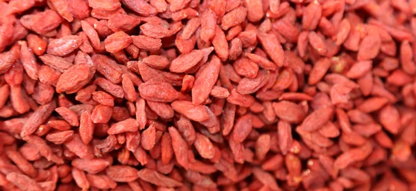 Fundo goji bagas para venda no mercado — Fotografia de Stock