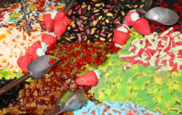 Cukros édességet és chewy, eladó candy istállóban a helyi jel — Stock Fotó