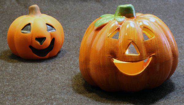 two jack o lantern symbols of Halloween