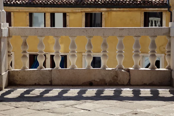 Marble balustrade with pillars and the shadow — Stock Photo, Image