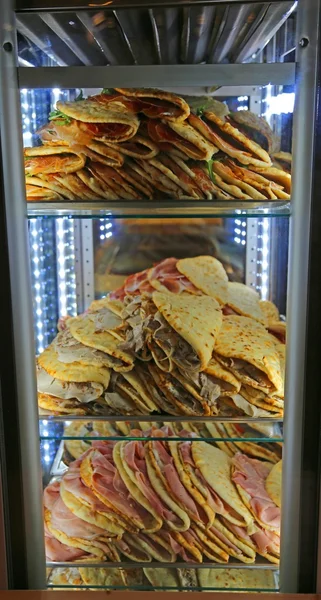 Piadina stuffed for sale in the restaurant in central Italy — Stock Photo, Image