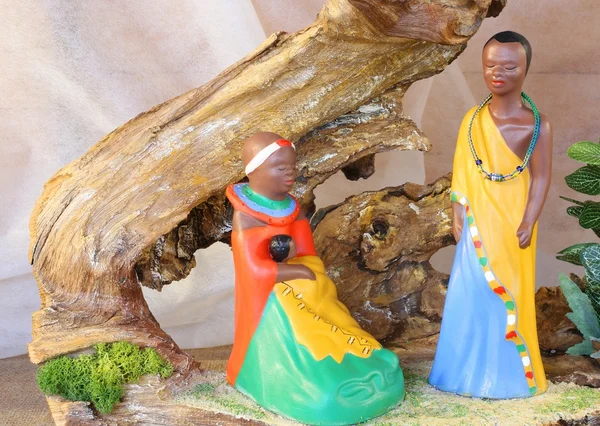 Cuna con cabaña africana y estatuas de la Sagrada Familia — Foto de Stock