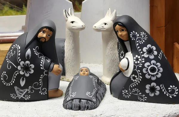 Crib of South America with baby Jesus and black small ceramic st — Stock Photo, Image