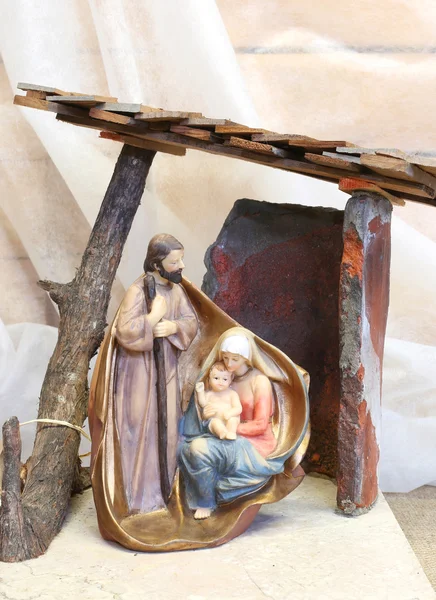 Christmas representation of the Holy Family with the statues of — Stock Photo, Image