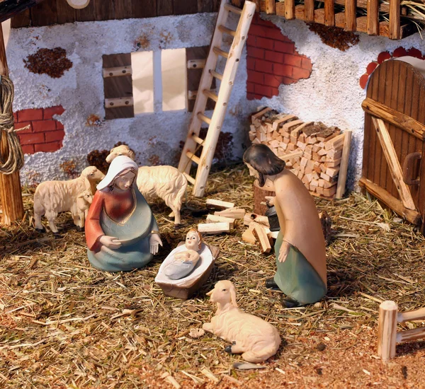 Classic nativity scene with baby Jesus Mary and Joseph in the ma — Stock Photo, Image