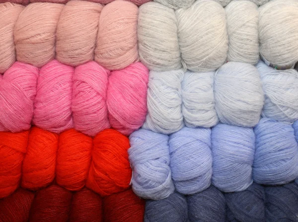 Soft balls of colored wool to create handmade sweaters — Stock Photo, Image