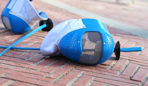 Equipment fencing mask and foil  after  the match — Stock Photo, Image