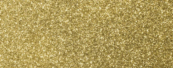 Bakgrund jämnt färgade golden glitter — Stockfoto