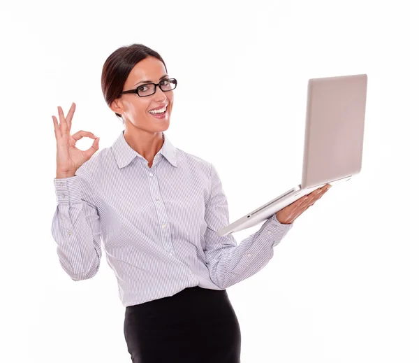 Satisfied businesswoman with laptop — Stock Photo, Image