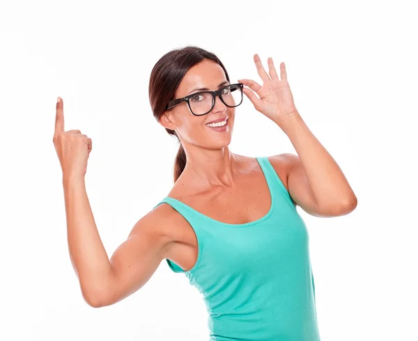 Woman pointing at copy space — Stock Photo, Image