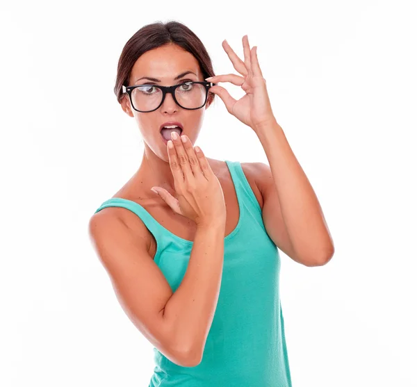 Surprised woman with hand to her mouth — Stock Photo, Image