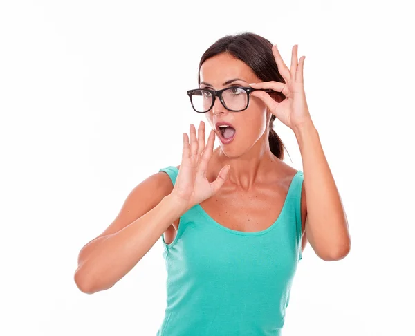 Shocked woman with hand to her mouth — Stock Photo, Image