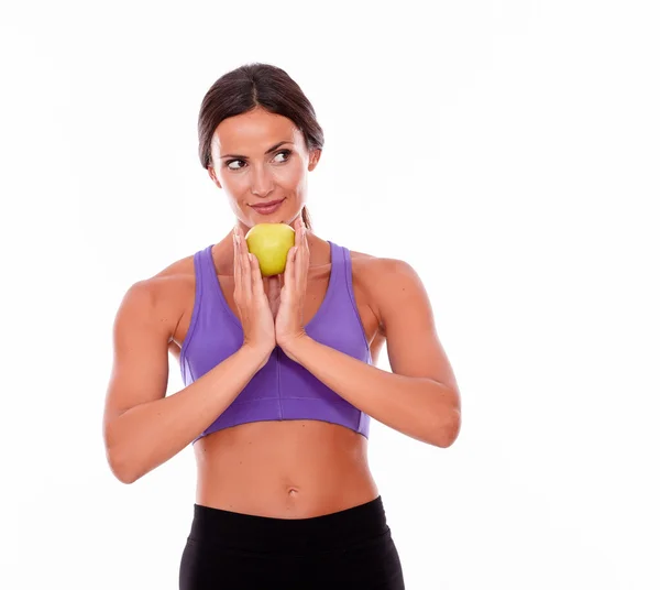 Mujer en forma joven sosteniendo una manzana —  Fotos de Stock