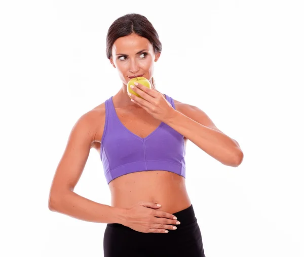 Slečno fit drží jablko — Stock fotografie