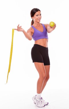 Apple ile sağlıklı gülümseyen kadın