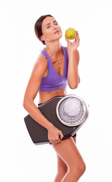 Healthy woman with apple and scales — Stock Photo, Image