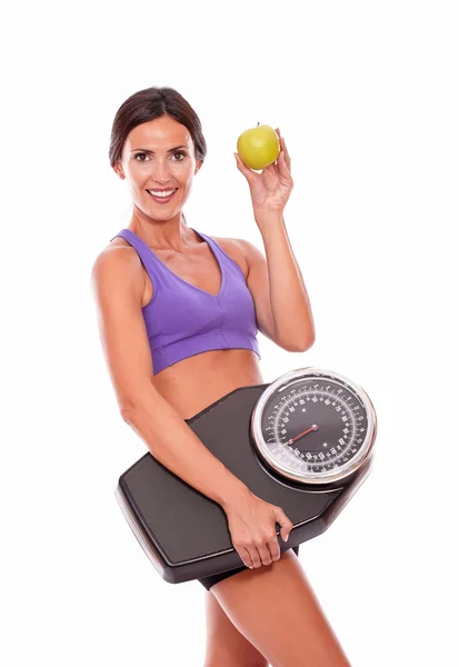 Zdrowa kobieta z jabłkiem i wagi — Zdjęcie stockowe