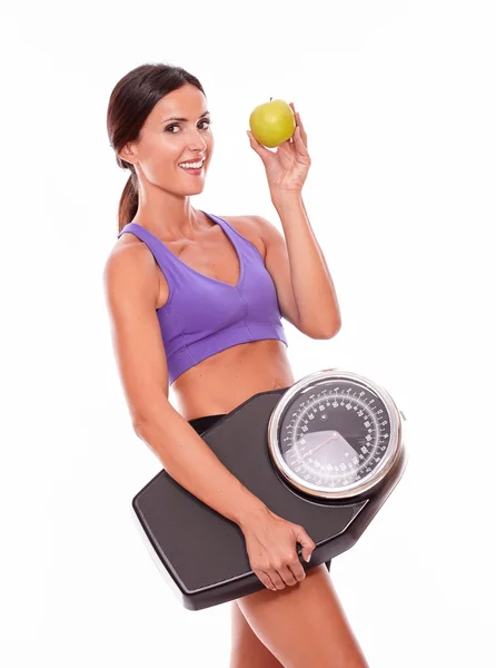 Apple ve ölçekleri ile sağlıklı kadın — Stok fotoğraf