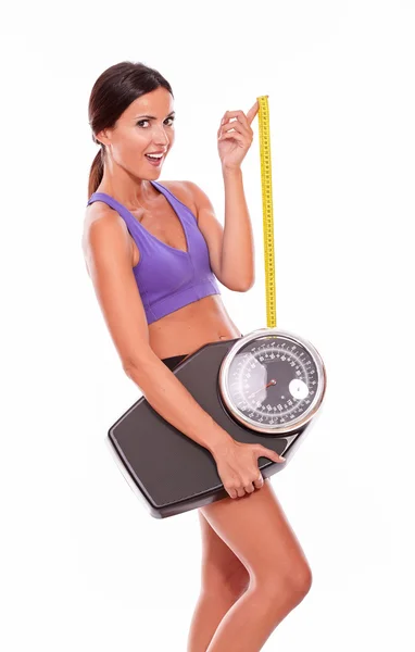 Healthy smiling woman with scales — Stock Photo, Image
